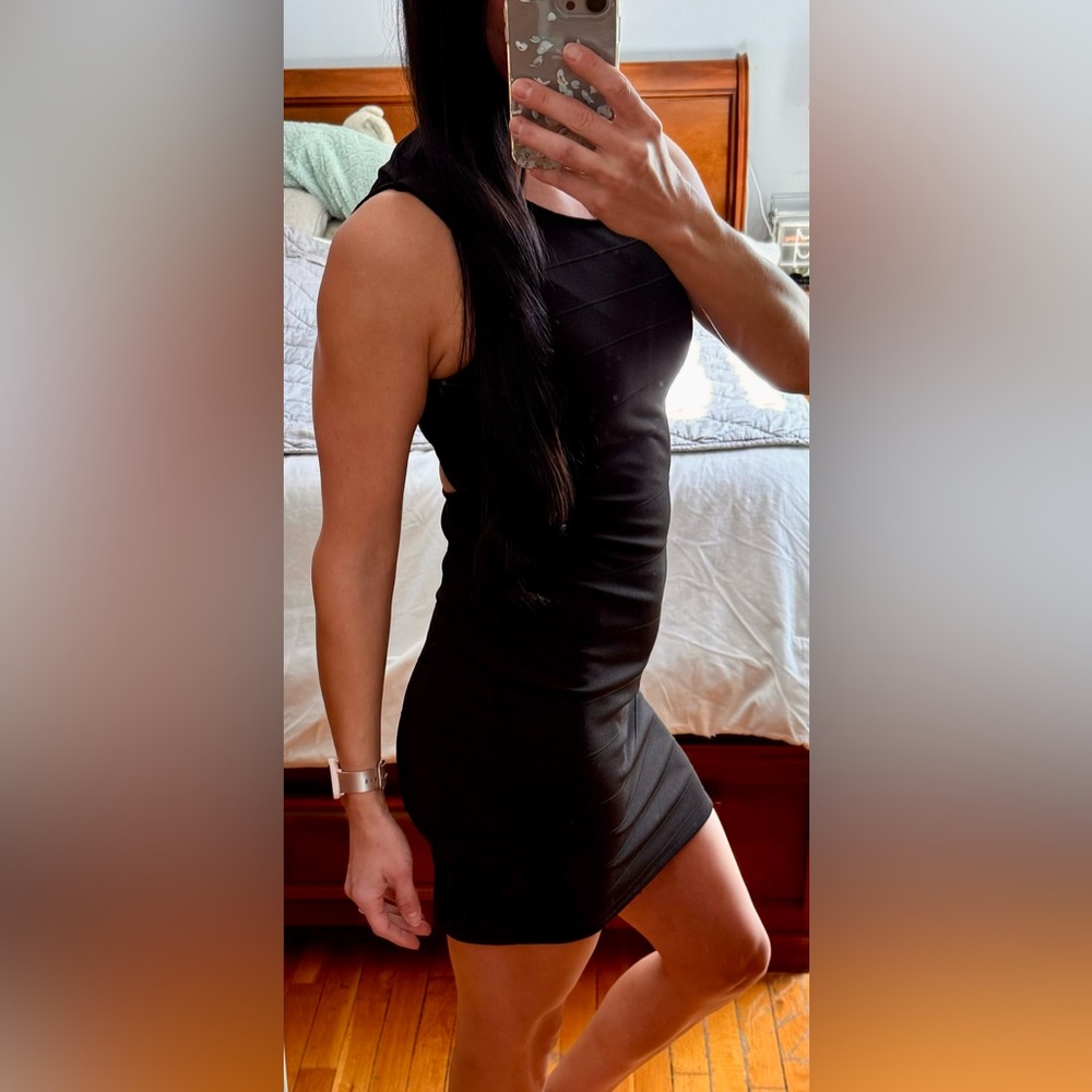 Monteau dress with cut out accent.